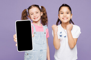 Little winner two friends kids children girls 9-10 years old wear casual clothes together hold in...