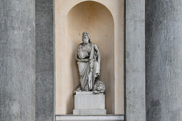 Statue of St Mark the Evangelist with the lion in a niche outside the Gran Madre di Dio Church (1831), Borgo Po district, Turin, Piedmont, Italy