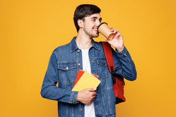 Young boy student wear jeans casual clothes backpack bag hold books takeaway delivery craft paper...