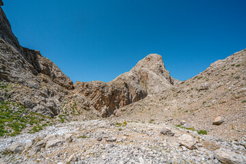 The scenic views of Demirkazık summit, Davlumbaz summit and dipsiz göl at the Aladağlar National park in Niğde, Turkey
