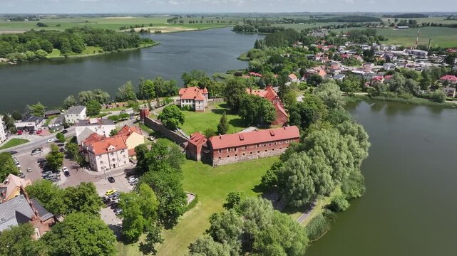 Aerial view of Sztum Castle by Lake Zajezierskie in Sztum, Poland