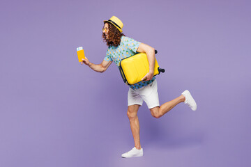 Traveler profile young man hold passport ticket bag be in rush isolated on plain purple background...