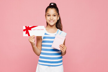 Traveler kid child wear casual clothes hold passport ticket store gift coupon voucher card isolated...