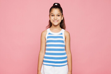 Traveler smiling happy kid child she wearing blue casual clothes look camera isolated on plain pink...