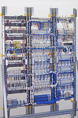 View from the back of the electrical panel. Connection of electronic modules using copper...