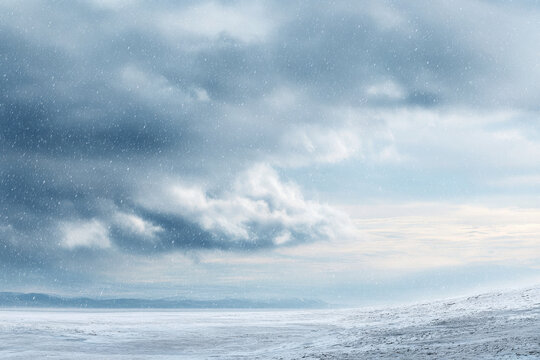 photorealistic ultraminimalistic image of gray winter sky covered in soft gentle snowflakes - Powered by Adobe