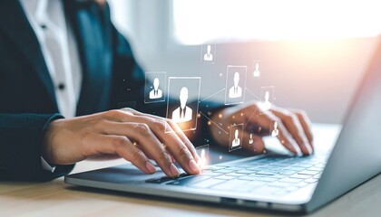 Businessperson working on a laptop with digital user icons overlay