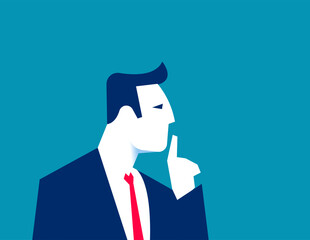 Asking. Man showing shh sign with finger near lips