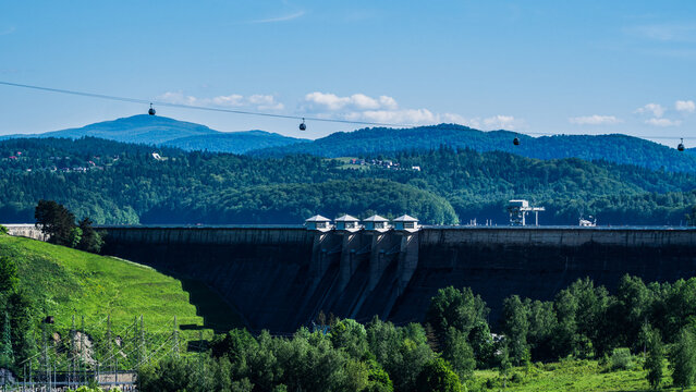 Cable Car Over Solina Lake Dam at Dusk with Full Moon in the Background, Bieszczady Mountains, Poland