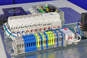 Electrical terminals with connected insulated copper wires with metal lugs. Marking with a thermal printer. 