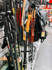 Hiking poles displayed in outdoor gear store for adventurers and trekkers