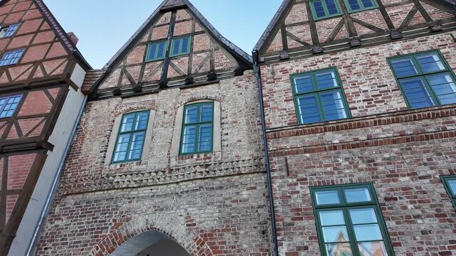 Half timbered red brick houses in the Schlachtenmarkt Square in the old town of Schwerin, Germany