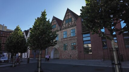 Half timbered red brick houses in the Schlachtenmarkt Square in the old town of Schwerin, Germany