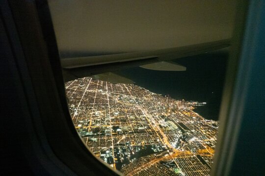 Chicago Illinois USA panorama view from plane window illuminator during flight
