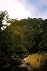Tropical jungle waterfalls on a gloomy day. Busay Falls, Odiongan, Romblon, Philippines