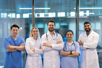 A diverse group of medical professionals stands confidently, embodying teamwork and expertise in a...