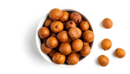 Round, light brown snacks in a white bowl