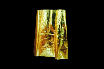 glass candle holder Reflective gold foil with a glossy, textured surface. Use for crafts, decoration, gift wrapping, or art projects.