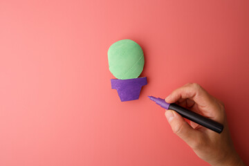 Paper cactus project with tools in progress, ideal for craft supply shops, school stationery brands, and packaging visuals for creative kits or art education sets for kids, © Elena