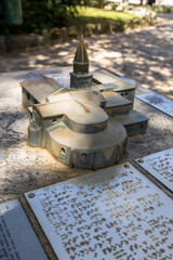 Braille representation of a historical building model with tactile features, designed for...
