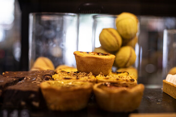 shortbread cakes with different fillings in a bakery