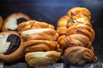 shortbread cakes with different fillings in a bakery