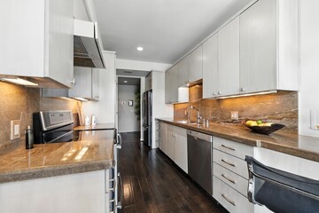 Spacious Condo with Modern Interiors, Private Balcony, and Pool Access