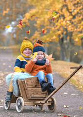 Colorful Autumn Joy: Kids Laughing in Nature's Splendor