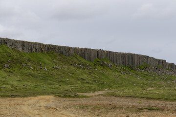 Gerduberg cliff with a cloudy sky view, Iceland.