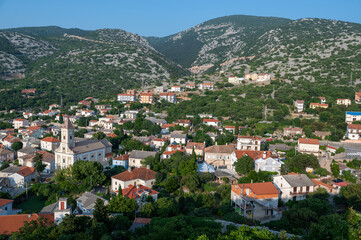 Fototapeta premium The small fishing village of Sveti Juraj on the Adriatic coast, at the foot of the Velebit Mountains in Croatia, Europe