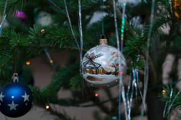 Christmas toys on the branches of the Christmas tree, New Year's Christmas decor, New Year's balls...