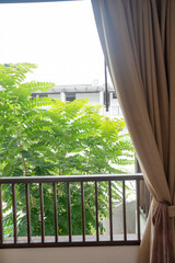 Cozy beige curtain empty hotel resort room