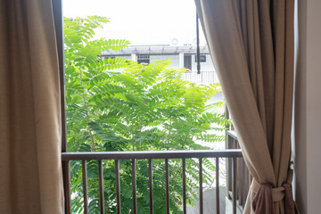 Cozy beige curtain empty hotel resort room