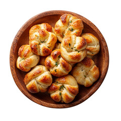 Wooden plate filled with freshly baked garlic knots on transparent background