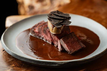 Meat served in luxurious setting 