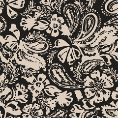 Paisley seamless vector pattern in traditional Oriental style. Decorated with flowers, leaves, and fantasy elements, for fabric, textile and wallpaper covers