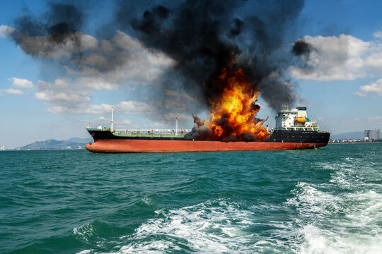 Fire on a cargo ship. A ship carrying liquefied gas is engulfed in flames. Explosion and fire on a gas carrier on the high seas.