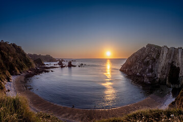 Magical sunset on Silencio Beach in Castañeras (Asturias, Spain)