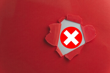 Concept for a wrong choice or incorrect answer. A red cross mark symbolizes a 'no' vote, a mistake, or a warning to stop. Negative result or failure symbol on a red background.