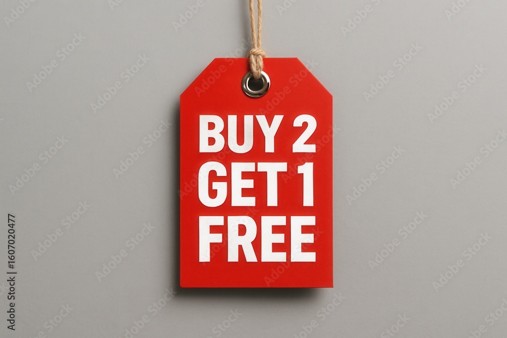 Poster a bright red sale tag with bold white text reading 