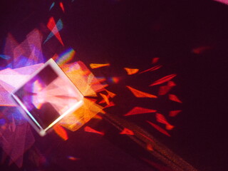 Colorful cube is reflected in a light, creating a beautiful and abstract image