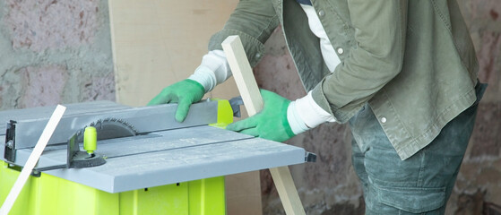 Caucasian craftsman working in a workshop.