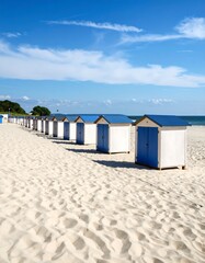 Beach huts on a sandy shore