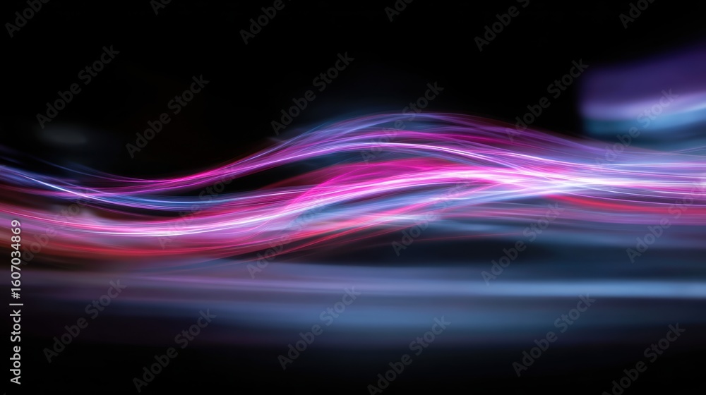Poster vibrant and dynamic light trails on a dark background, perfect for abstract art and design projects.