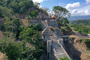 Construction of Stone Staircase and Balinese Temple on a Mountain Slope