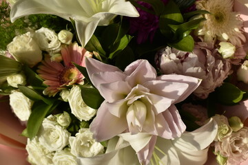 stunning bouquet: white roses, gerberas and lily bud top view	