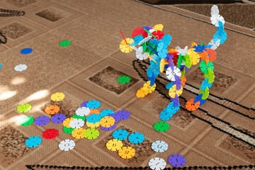 Plastic constructor to play at home. Plastic children's construction set. Children's toy set.