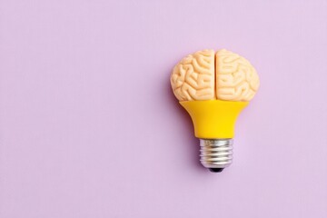 Light bulb with brain design on pastel background