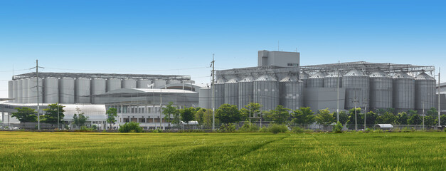 Fototapeta premium Agricultural Silos - Building Exterior, Storage and drying of gr
