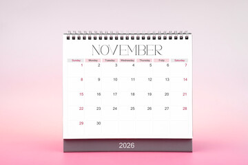 Desktop monthly calendar for November 2026 on pink color background.